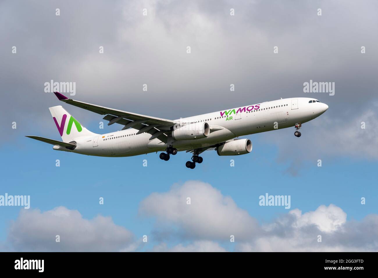 Wamos Air Airbus A330 airliner jet plane landing at London Heathrow Airport UK with Afghan refugees, repatriations, flying from Dubai. Spanish airline Stock Photo