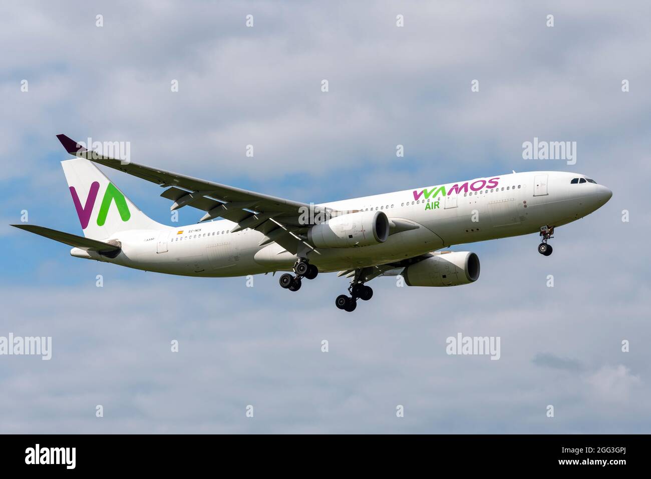 Wamos Air Airbus A330 airliner jet plane landing at London Heathrow Airport, UK, with Afghan refugees, repatriations, flying from Dubai. Afghanistan Stock Photo