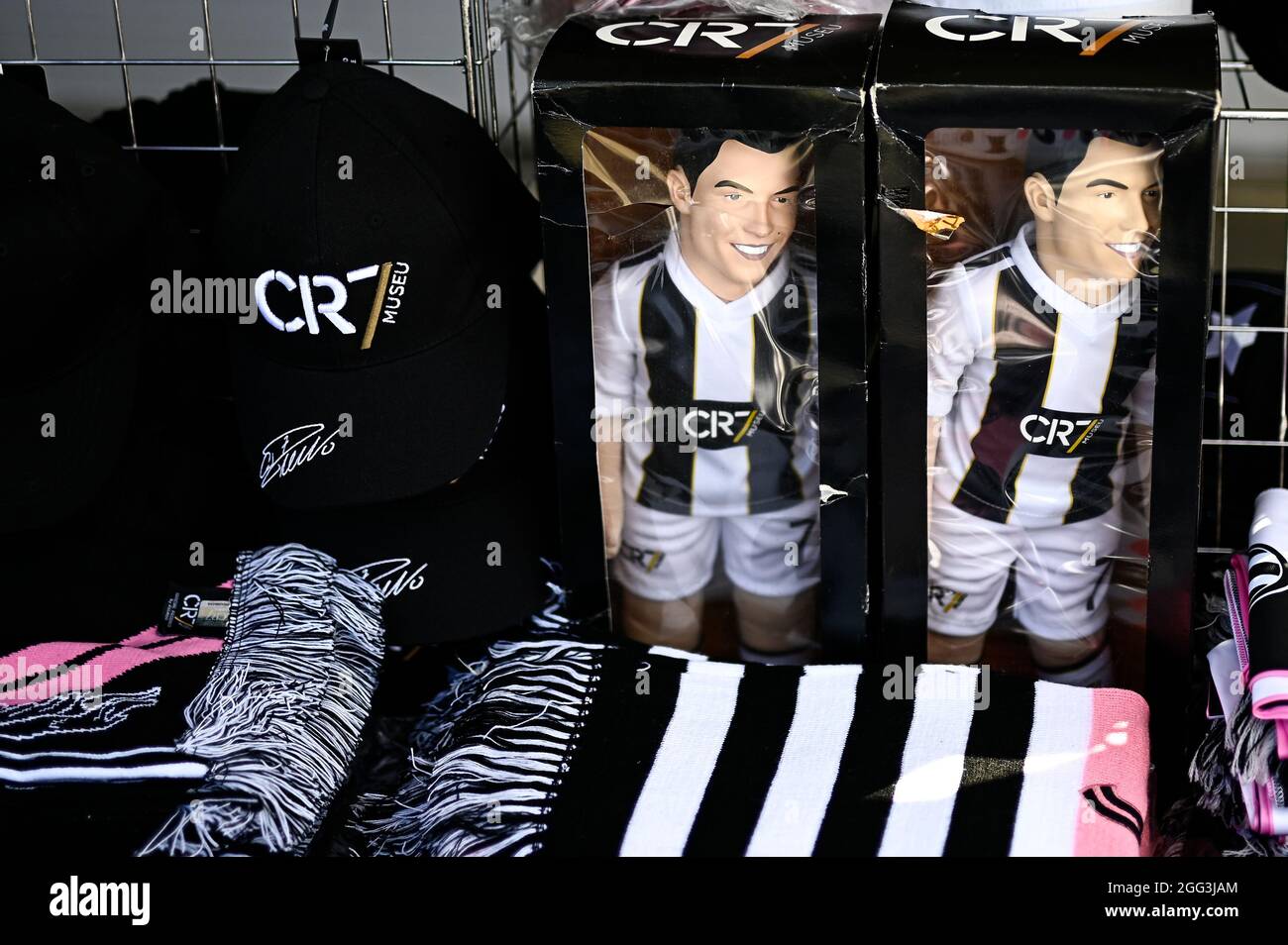 Turin, Italy. 28 August 2021. Two action figures of Cristiano Ronaldo are seen outside Allianz Stadium. Cristiano Ronaldo left Juventus FC on August 27 during summer transfer window to join Manchester United FC. Credit: Nicolò Campo/Alamy Live News Stock Photo