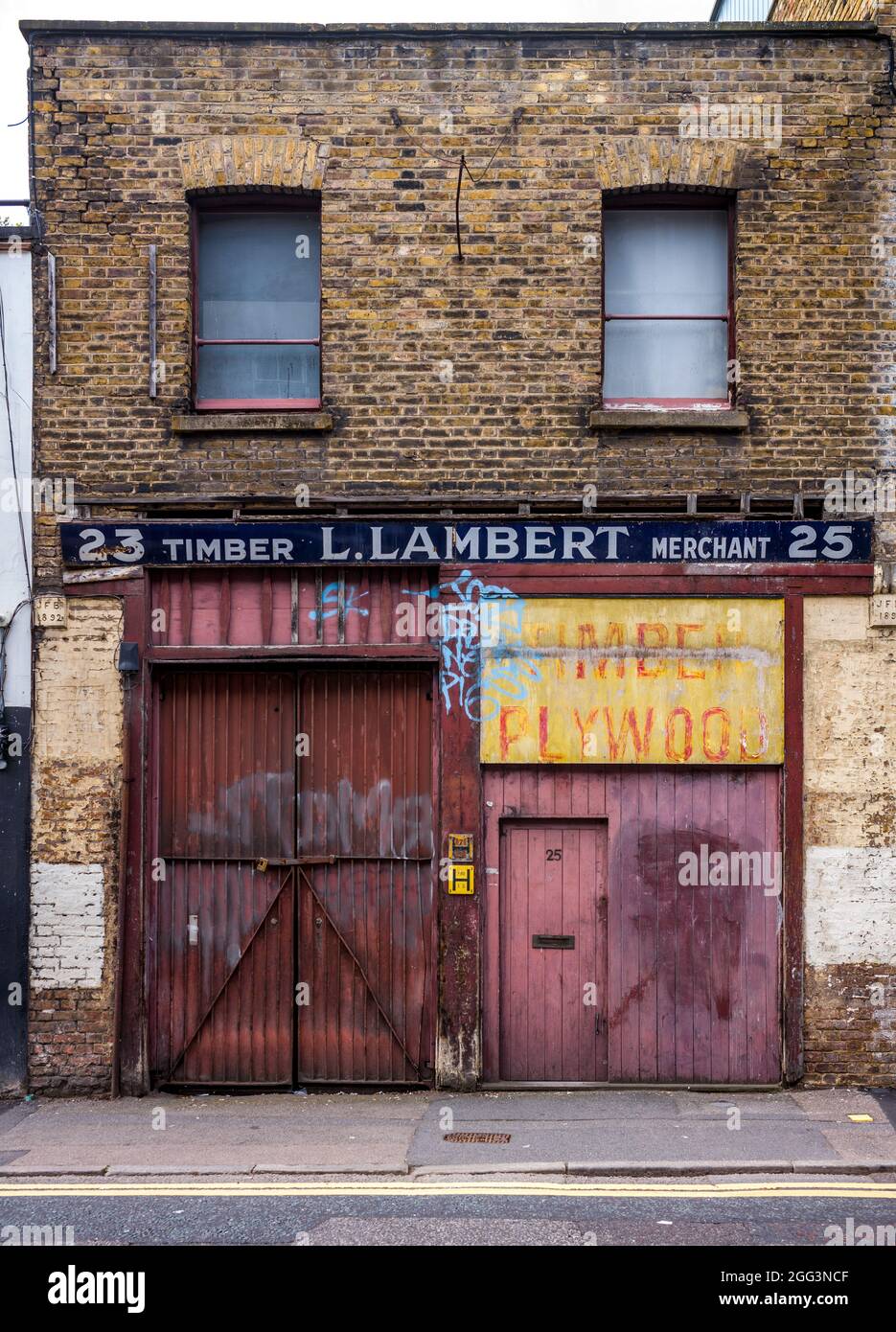 Vintage London Shop Front - L. Lambert Timber Merchant Hoxton Street East London. London Vintage Store Fronts. Stock Photo