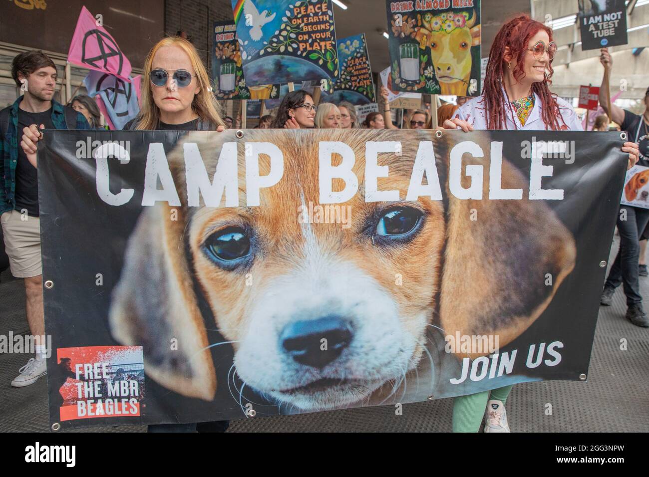 London, UK. 28th Aug, 2021. Protesters in London hold banners and signs ...