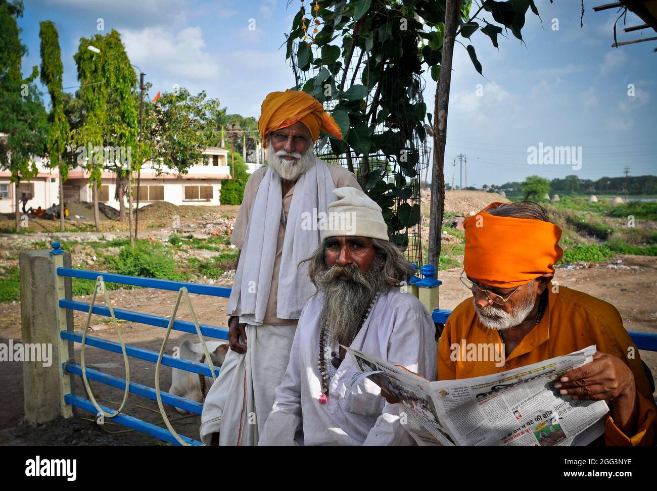 Hindu pilgrims and holy men or Sadhus participate in the holy pilgrimages of Yatra at the holy cities of Haridwar and Varanasi on the River Ganges in India Stock Photo
