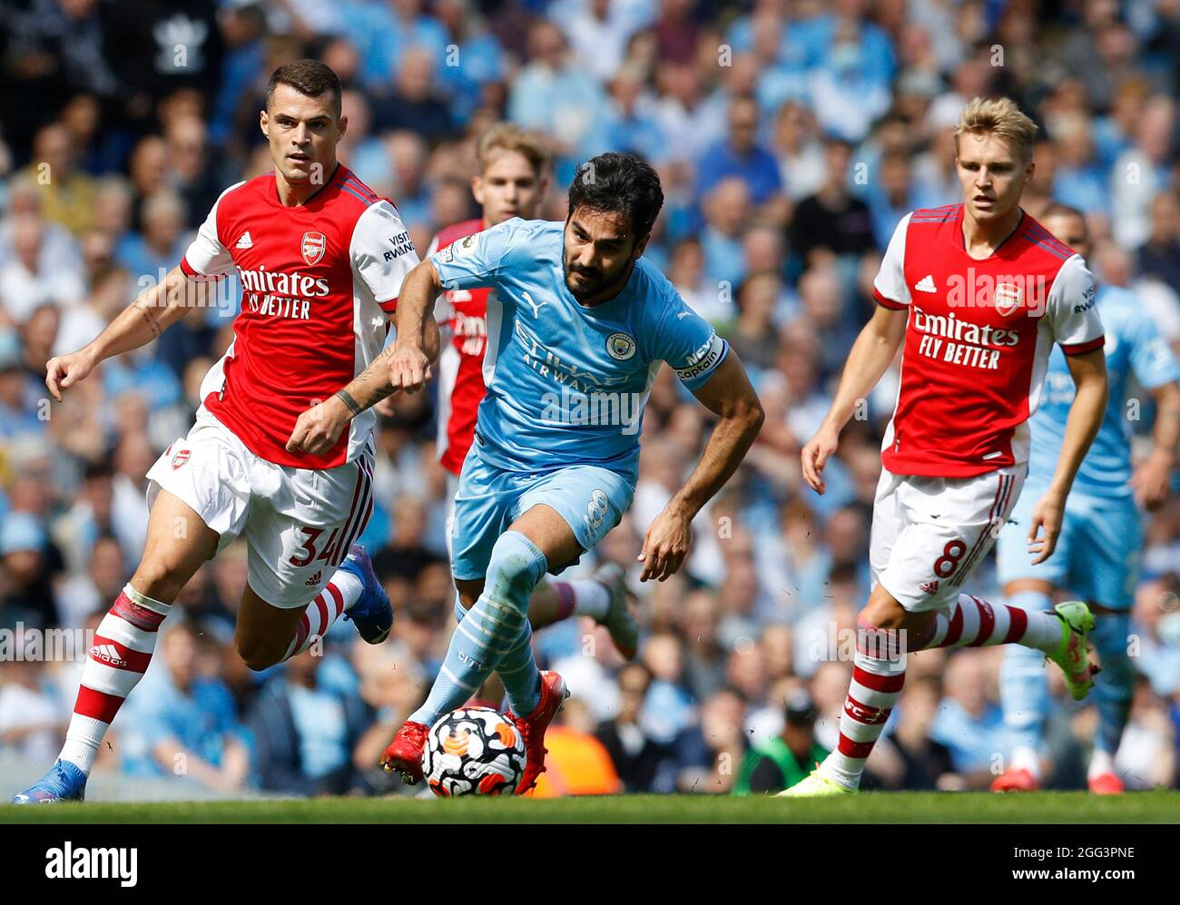Manchester, England, 28th August 2021.  Ilkay Gundogan of Manchester City runs at the Arsenal defence during the Premier League match at the Etihad Stadium, Manchester. Picture credit should read: Darren Staples / Sportimage Stock Photo
