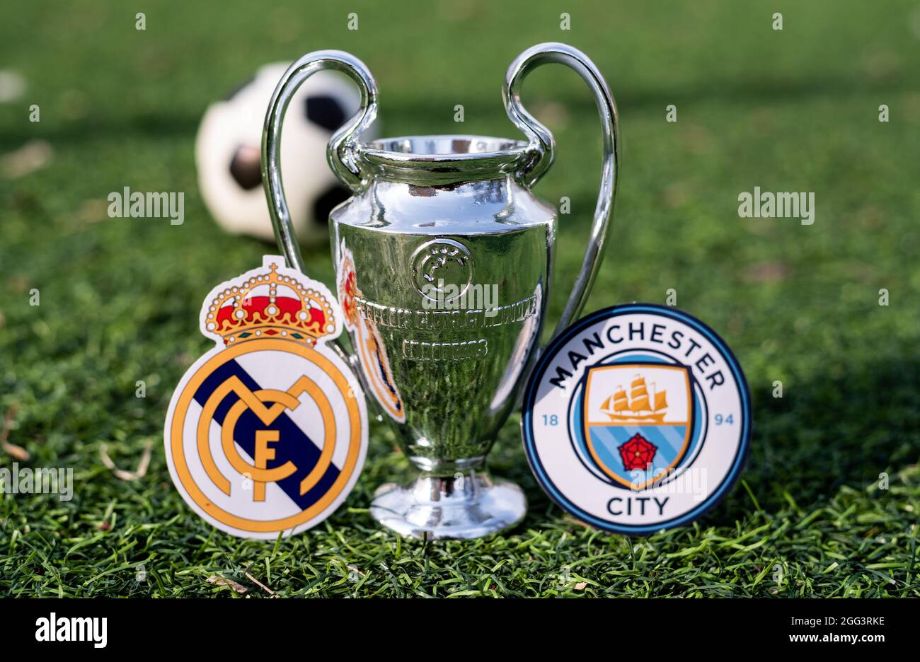 April 16 21 Moscow Russia The Uefa Champions League Cup And The Emblems Of The Football Clubs Manchester City F C And Real Madrid Cf On The Gre Stock Photo Alamy