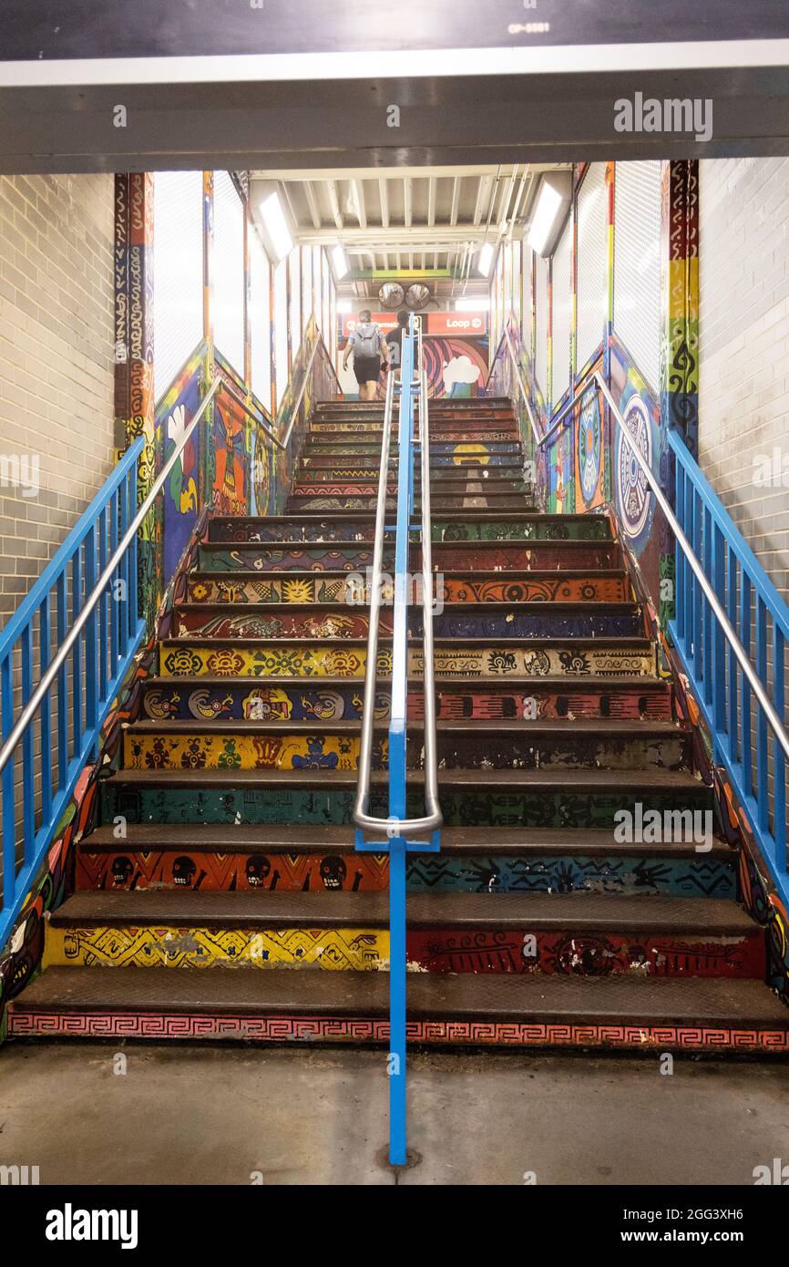 Painted staircase in the 18th L station in the Pilsen neighborhood of Chicago, Illinois, USA. Stock Photo