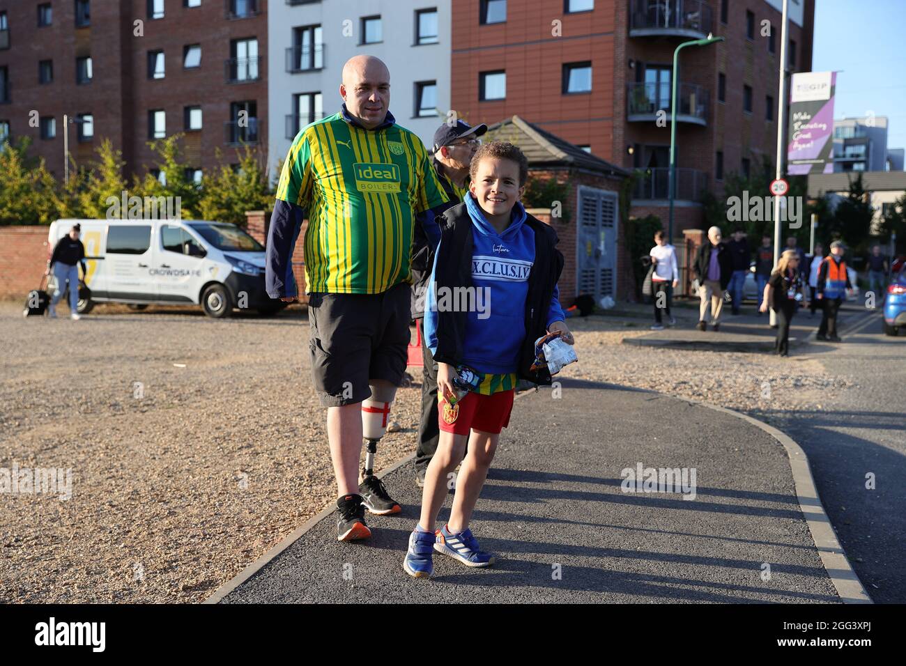 PETERBOROUGH, UK. AUGUST 28TH. West Brom fans arrive ahead of the Sky Bet Championship match between Peterborough and West Bromwich Albion at Weston Homes Stadium, Peterborough on Saturday 28th August 2021. (Credit: James Holyoak | MI News) Credit: MI News & Sport /Alamy Live News Stock Photo
