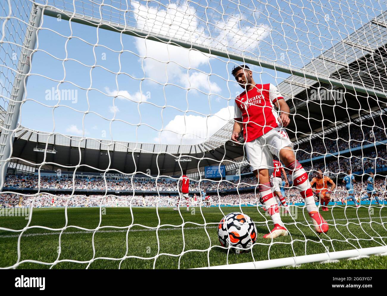 Manchester, England, 28th August 2021.  Sead Kolasinac of Arsenal retrieves the ball from the back of the net  during the Premier League match at the Etihad Stadium, Manchester. Picture credit should read: Darren Staples / Sportimage Stock Photo