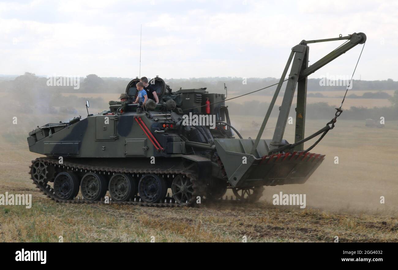 Tank mod millitary vehicle digger excavator hires stock photography
