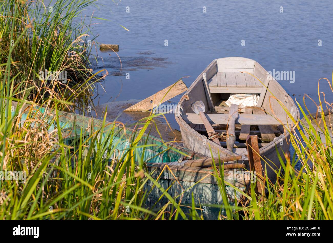 old boat on the river Stock Photo - Alamy