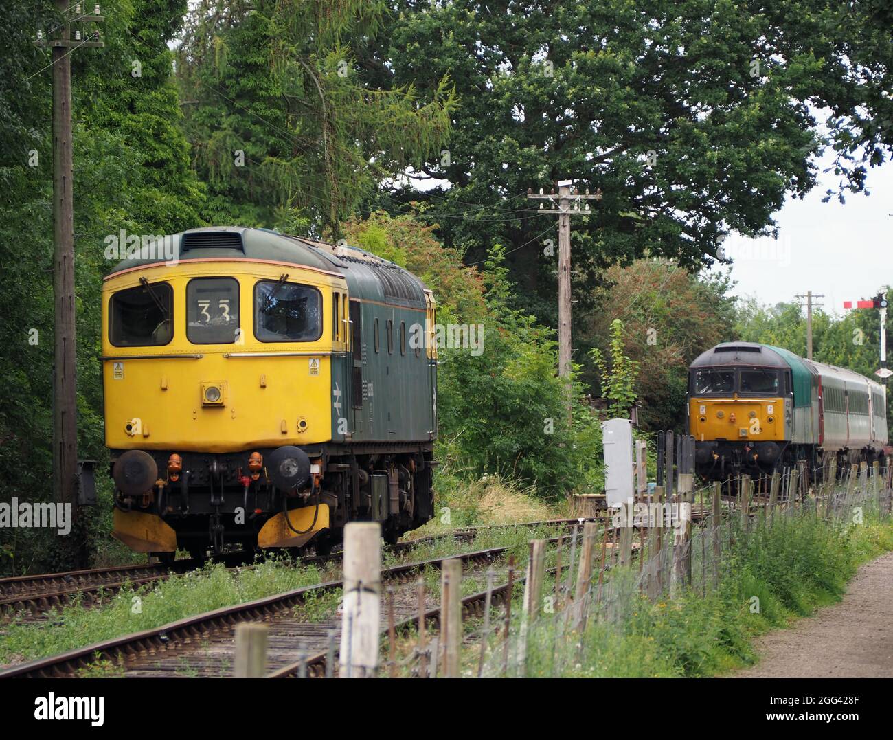 Class 33 Locomotive 33053 waits on the siding at the Northampton and Lamport Railway. Class 47 locomotive 47205 is in the background Stock Photo