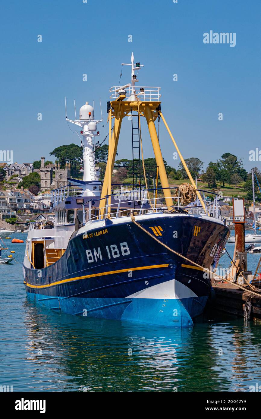 Polruan Quayside with the Trawler 'Sam of Ladram' moored alongside - Polruan, Cornwall, UK. Stock Photo