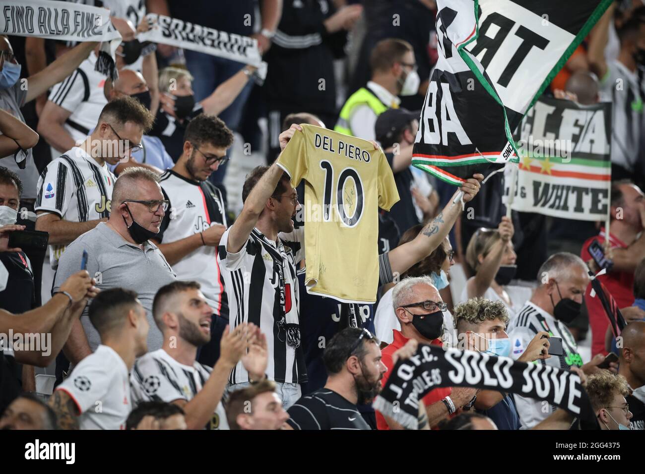 Turin, Italy, 28th August 2021. A fan holds up a jersey bearing the name of Alessandro Del Piero during the Serie A match at Allianz Stadium, Turin. Picture credit should read: Jonathan Moscrop / Sportimage Stock Photo