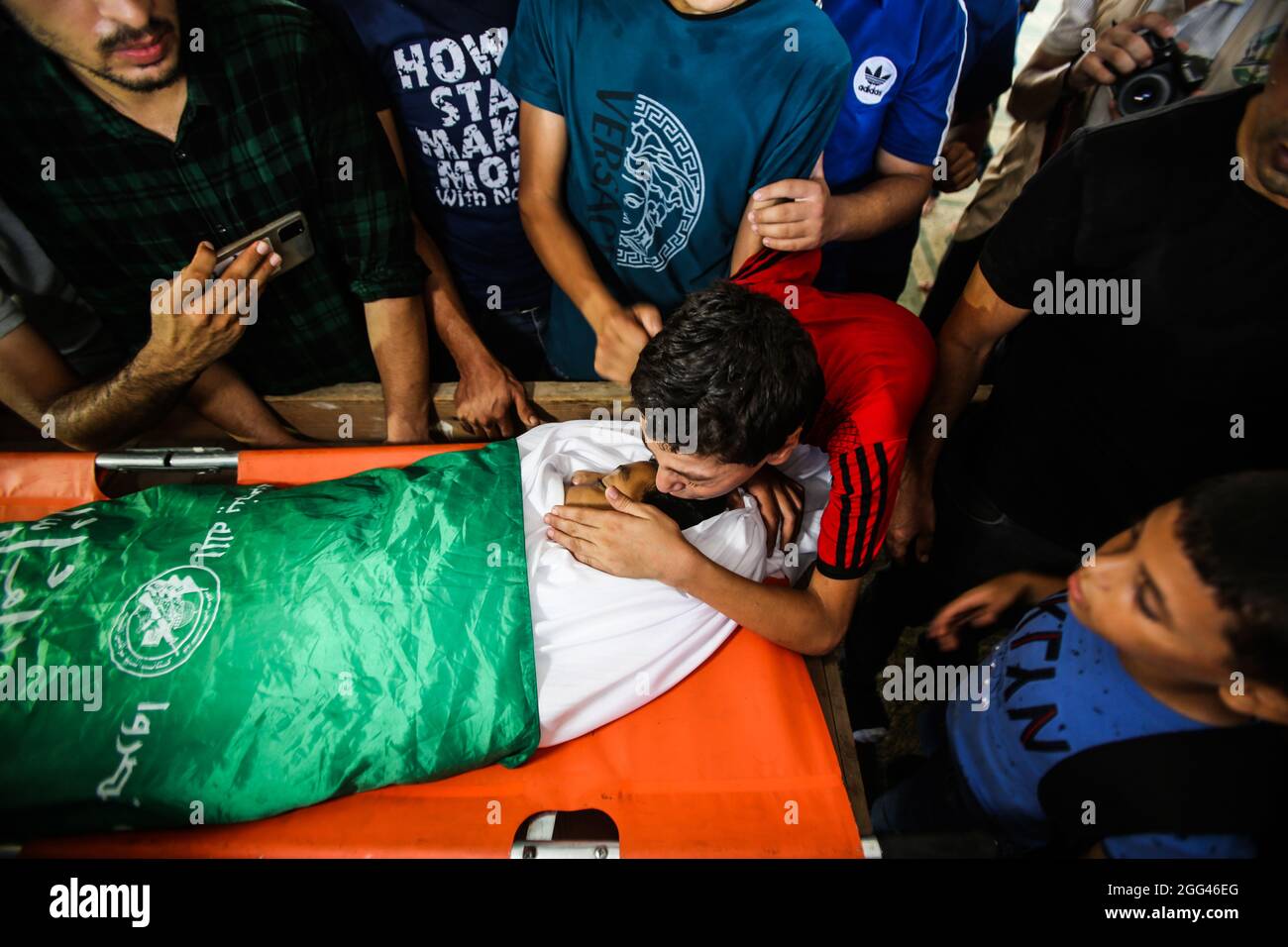 EDITORS NOTE: Image depicts death)Relatives of a Palestinian teen Omar Abu  Neal mourn near his body during the funeral. Palestinian teenager was  injured on August 21 during the demonstration arranged by the