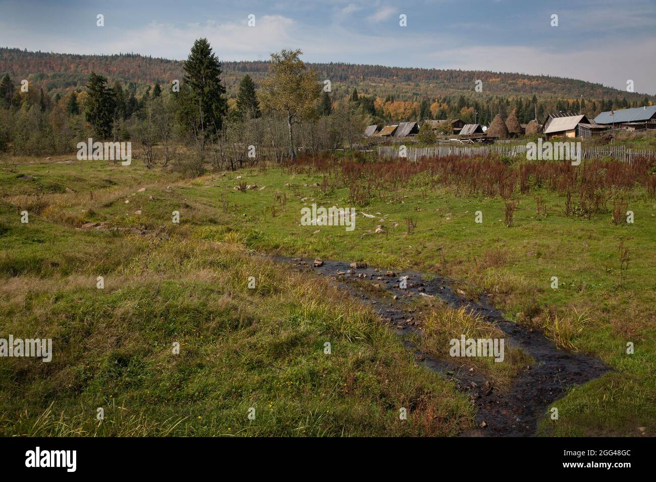 Stream of water in the field Stock Photo - Alamy