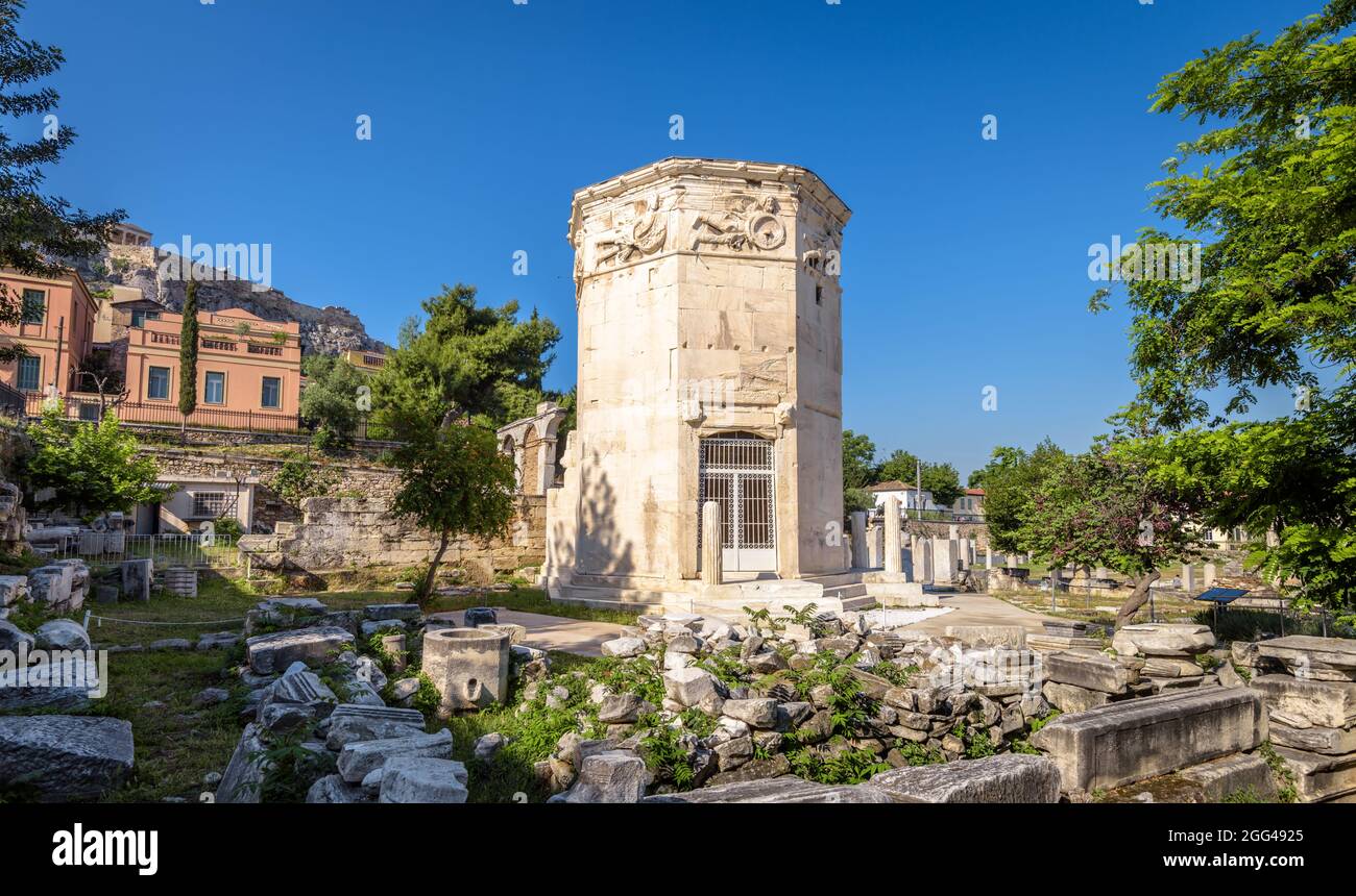 Tower of Winds or Aerides in Roman Agora, Athens, Greece. It is landmark of Athens. Panorama of Ancient Greek ruins near Plaka district, historical bu Stock Photo
