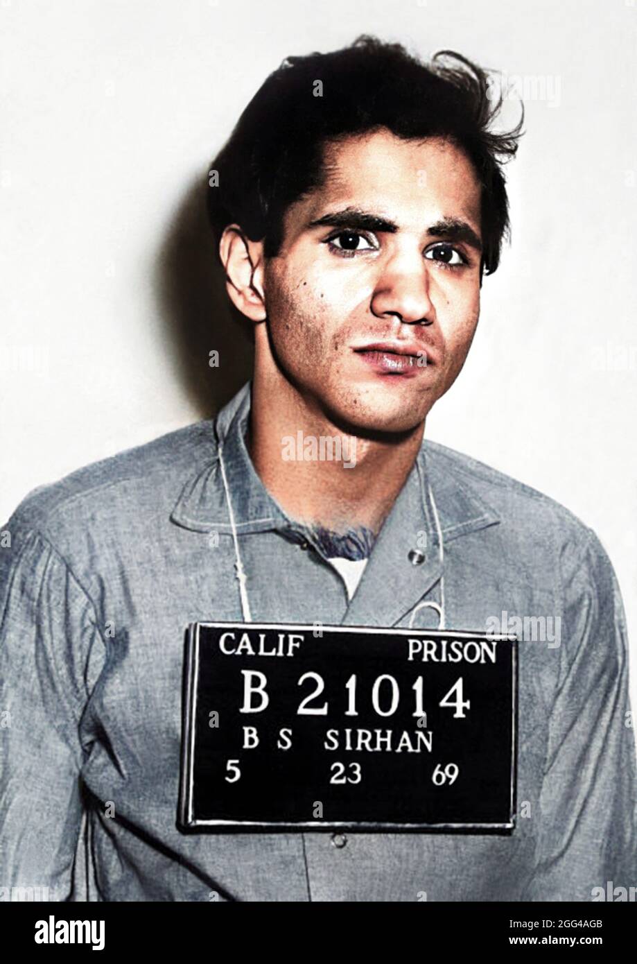 1969 , 23 may , CALIFORNIA , USA : The Palestinian born Jordanian citizen SIRHAN SIRHAN ( Sirhan Bishara Sirhan , born in 1944 ), Police Department mug shot at San Quentin State Prison, the killer who murdered the Senator ROBERT KENNEDY the day June 5, 1968 . Unknown photographer . DIGITALLY COLORIZED .- BOB - portrait - ritratto  - FOTO SEGNALETICA della POLIZIA  - MUG-SHOT - MUGSHOT - assassino - CRONACA NERA - KILLER - COMPLOT - COMPLOTTO - TERRORISTA - TERRORIST - ERGASTOLO - ERGASTOLANO - carcerato --- Archivio GBB Stock Photo