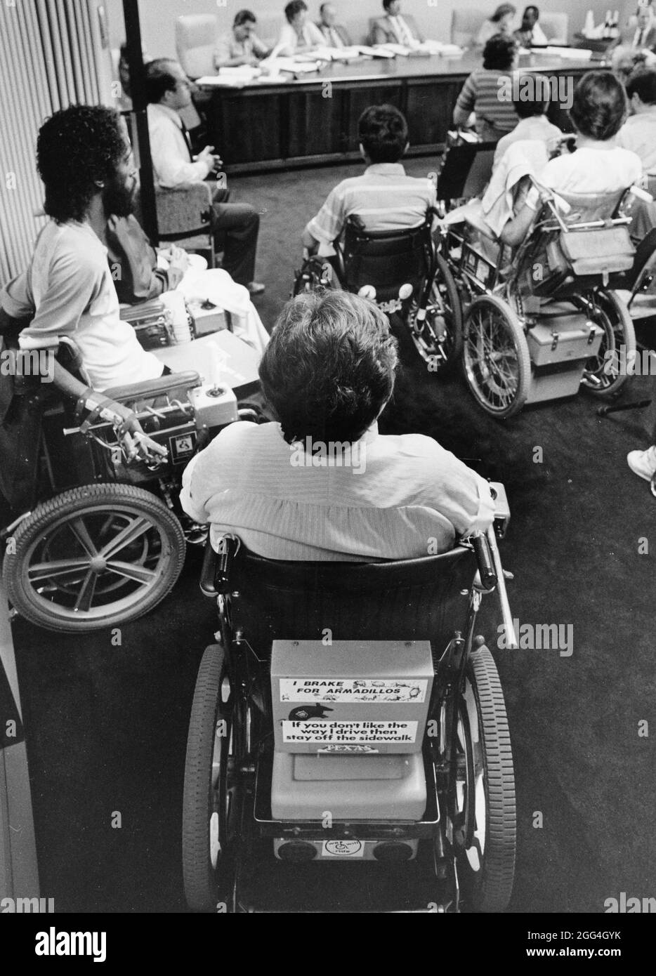 © 1990 Disabled rights advocates before the city transportation board, Austin, TX Stock Photo