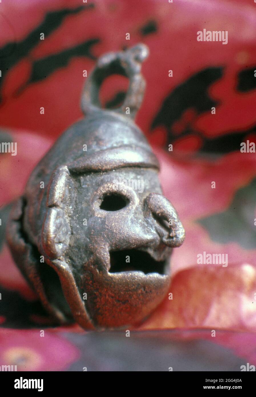 Metal figurine retrieved from the sacred cenote at Chichen Itza by the archeological team of 1967 under the leadership of Román Piña Chán. Stock Photo