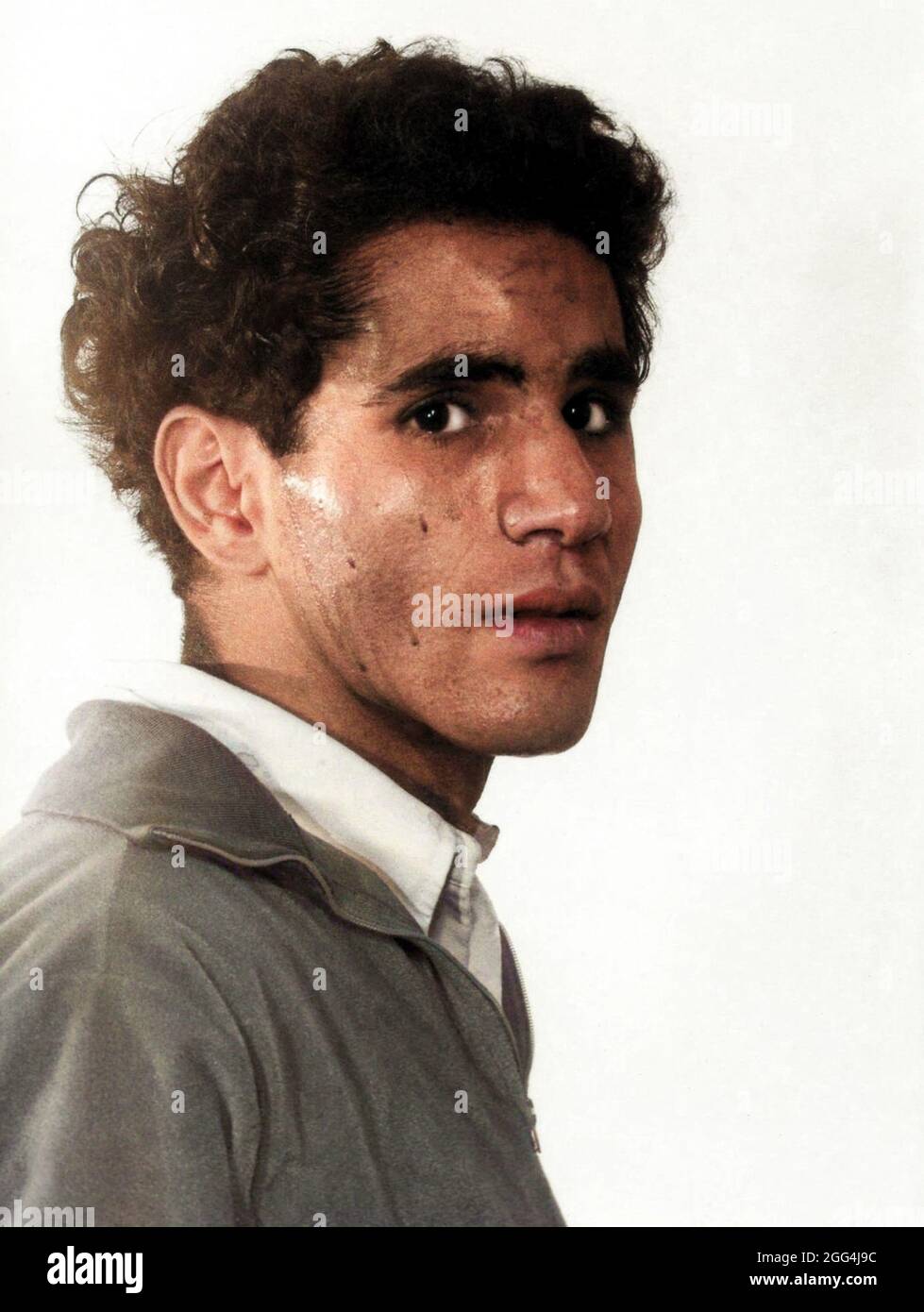 1968 , 5 june , Los Angeles , USA : The Palestinian born Jordanian citizen SIRHAN SIRHAN ( Sirhan Bishara Sirhan , born in 1944 ), Los Angeles Police Department mug shot, the killer who murdered the Senator ROBERT KENNEDY the day June 5, 1968 . Unknown photographer . DIGITALLY COLORIZED .- BOB - portrait - ritratto  - FOTO SEGNALETICA della POLIZIA  - MUG-SHOT - MUGSHOT - assassino - CRONACA NERA - KILLER - COMPLOT - COMPLOTTO - TERRORISTA - TERRORIST - ERGASTOLO - ERGASTOLANO - carcerato --- Archivio GBB Stock Photo