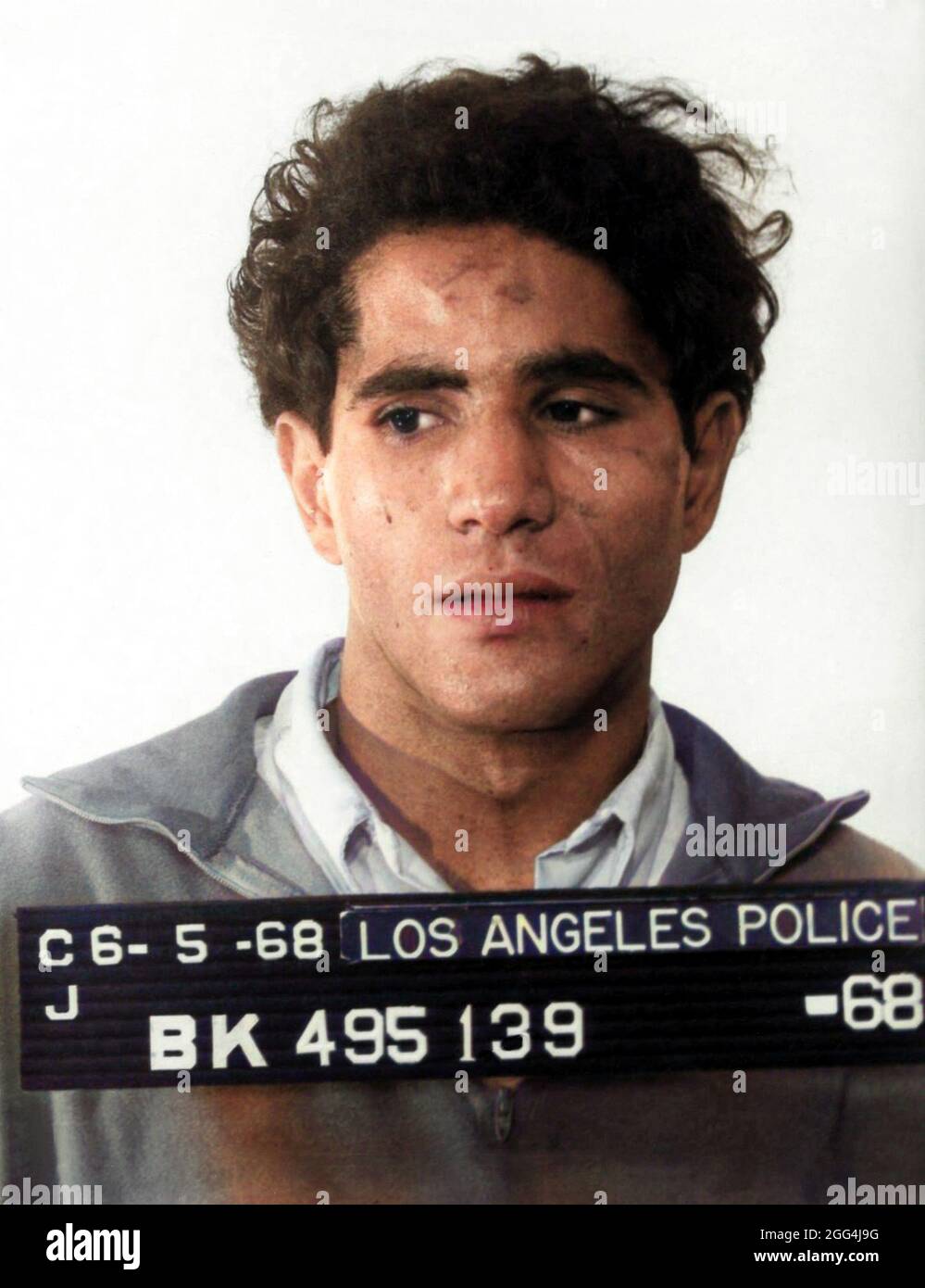 1968 , 5 june , Los Angeles , USA : The Palestinian born Jordanian citizen SIRHAN SIRHAN ( Sirhan Bishara Sirhan , born in 1944 ), Los Angeles Police Department mug shot, the killer who murdered the Senator ROBERT KENNEDY the day June 5, 1968 . Unknown photographer .  DIGITALLY COLORIZED .- BOB - portrait - ritratto  - FOTO SEGNALETICA della POLIZIA  - MUG-SHOT - MUGSHOT - assassino - CRONACA NERA - KILLER - COMPLOT - COMPLOTTO - TERRORISTA - TERRORIST - ERGASTOLO - ERGASTOLANO - carcerato --- Archivio GBB Stock Photo