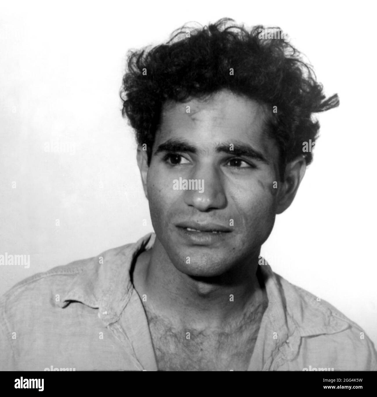 1968 , 5 june , Los Angeles , USA : The Palestinian born Jordanian citizen SIRHAN SIRHAN ( Sirhan Bishara Sirhan , born in 1944 ), Los Angeles Police Department mug shot, the killer who murdered the Senator ROBERT KENNEDY the day June 5, 1968 . Unknown photographer .- BOB - portrait - ritratto  - FOTO SEGNALETICA della POLIZIA  - MUG-SHOT - MUGSHOT - assassino - CRONACA NERA - KILLER - COMPLOT - COMPLOTTO - TERRORISTA - TERRORIST - ERGASTOLO - ERGASTOLANO - carcerato --- Archivio GBB Stock Photo