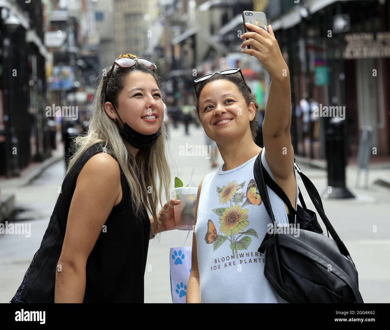 New Orleans, United States. 28th Aug, 2021. Brenda Beltran and Johnna Keeper, both from Fort Collins, Colorado take a selfie on Bourbon Street before heading to the airport to fly back home as Hurricane Ida approaches the city of New Orleans on Saturday, August 28, 2021. Photo by AJ Sisco/UPI Credit: UPI/Alamy Live News Stock Photo