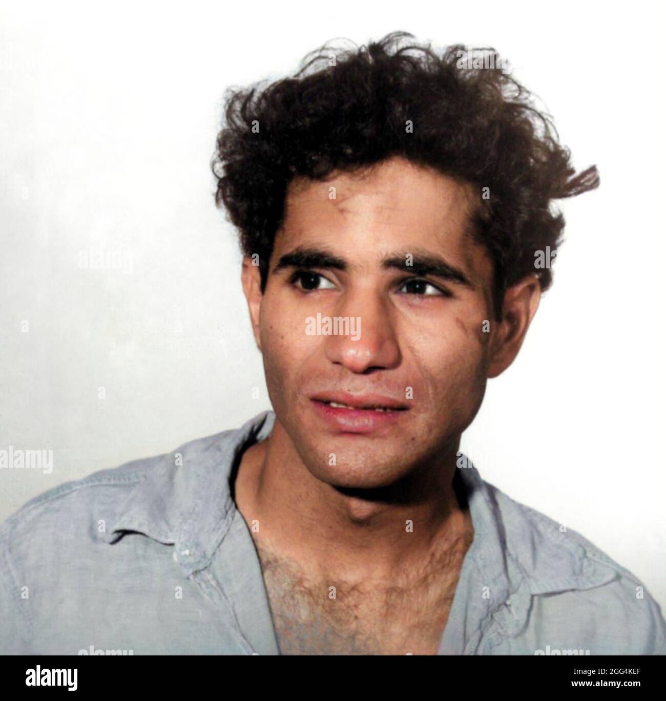 1968 , 5 june , Los Angeles , USA : The Palestinian born Jordanian citizen SIRHAN SIRHAN ( Sirhan Bishara Sirhan , born in 1944 ), Los Angeles Police Department mug shot, the killer who murdered the Senator ROBERT KENNEDY the day June 5, 1968 . Unknown photographer . DIGITALLY COLORIZED .- BOB - portrait - ritratto  - FOTO SEGNALETICA della POLIZIA  - MUG-SHOT - MUGSHOT - assassino - CRONACA NERA - KILLER - COMPLOT - COMPLOTTO - TERRORISTA - TERRORIST - ERGASTOLO - ERGASTOLANO - carcerato --- Archivio GBB Stock Photo