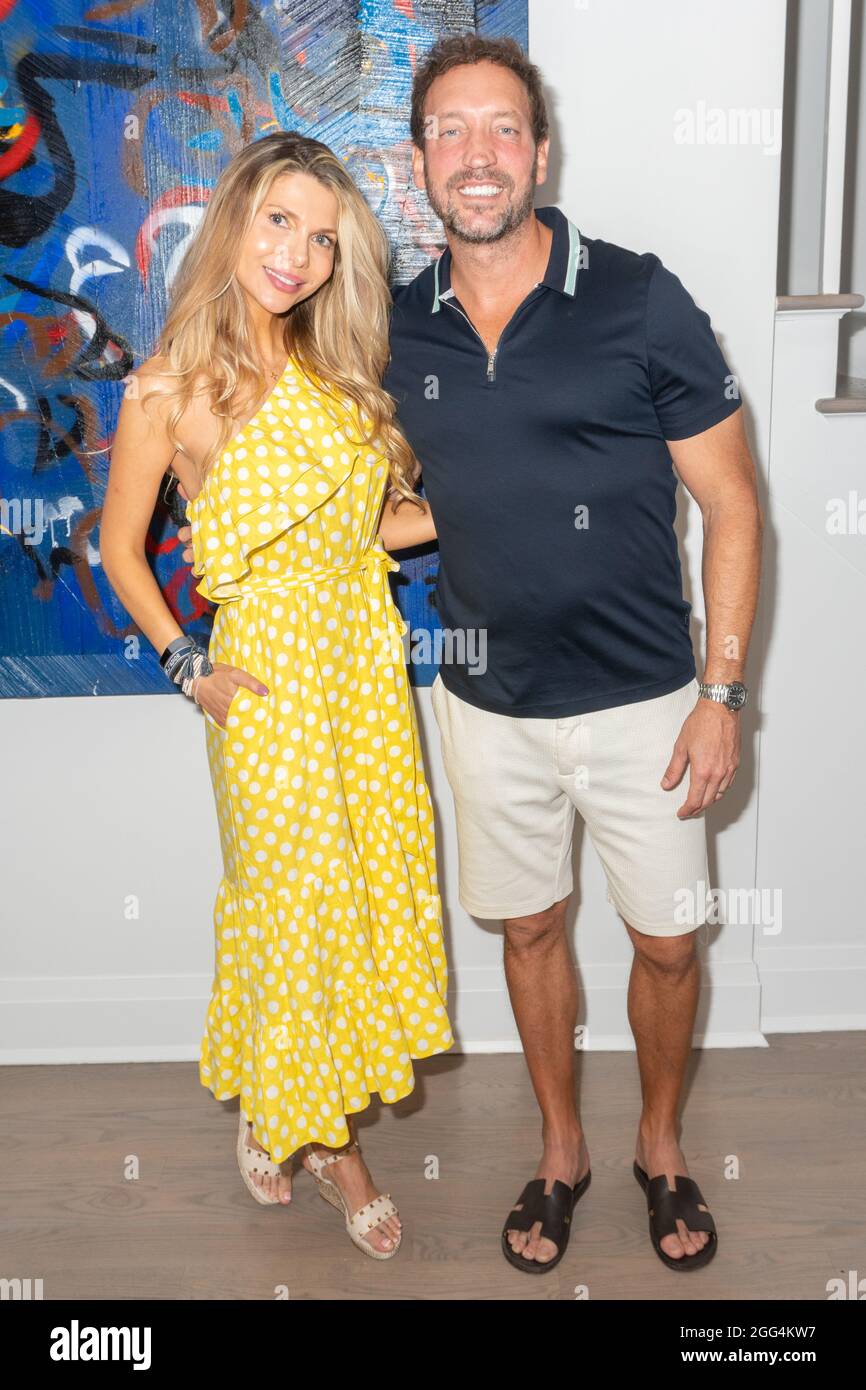 Hosts Anna Michalczyk and Joe Michalczyk attend Zero G Hamptons End of the  Summer Season BBQ