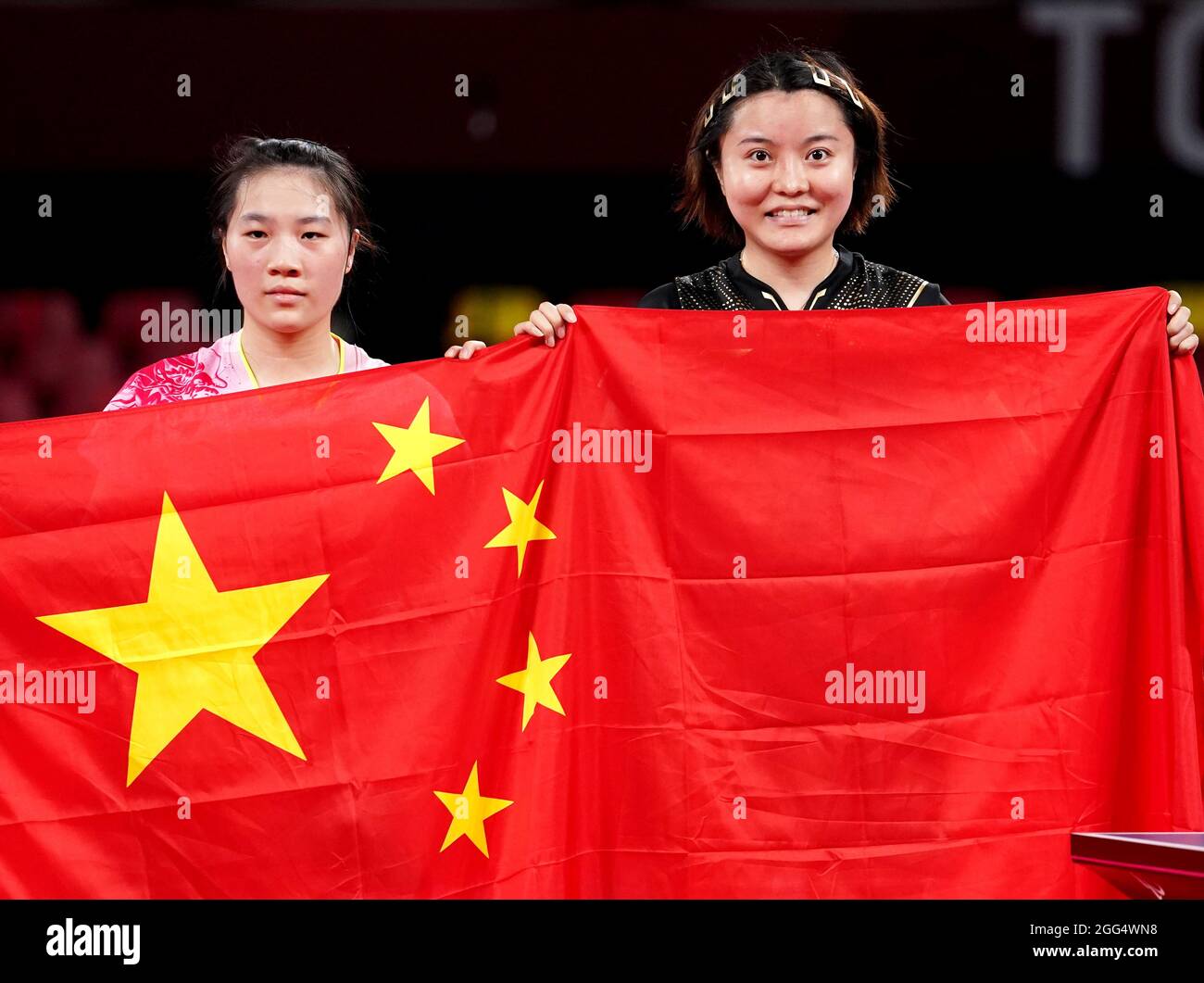 China's Wenjuan Huang (left) and Jingian Mao after the Women's Singles ...