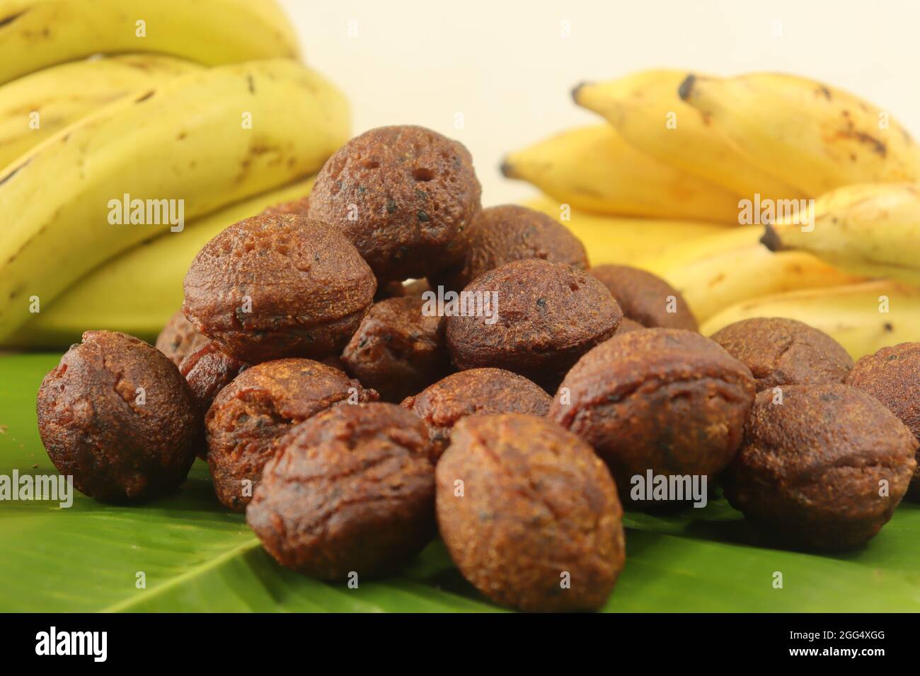 Rice fritters made with a batter of rice flour, banana, jaggery and
