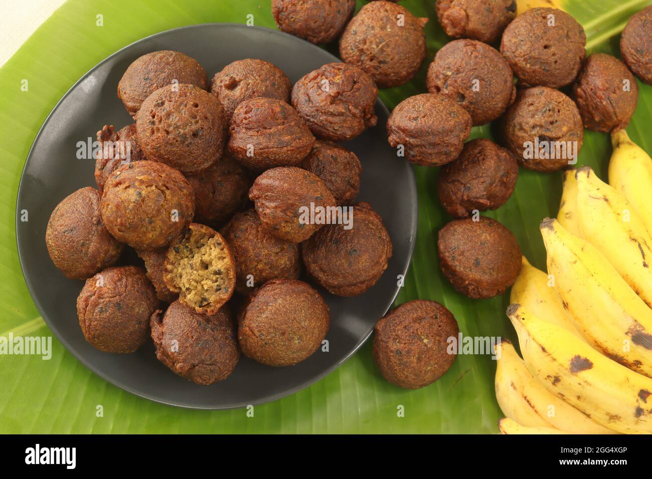 Rice fritters made with a batter of rice flour, banana, jaggery and