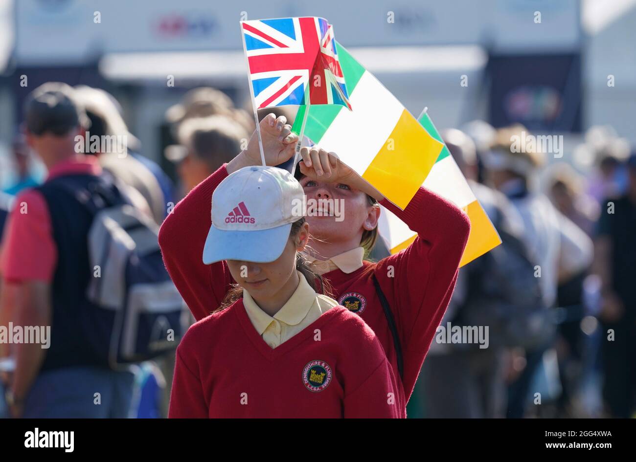 Young fans fix flags in their hair before the 2021 Curtis Cup Day 3 - Singles at Conwy Golf Club, Conwy, Wales on Saturday, Aug. 28, 2021. (Steve Flyn Stock Photo