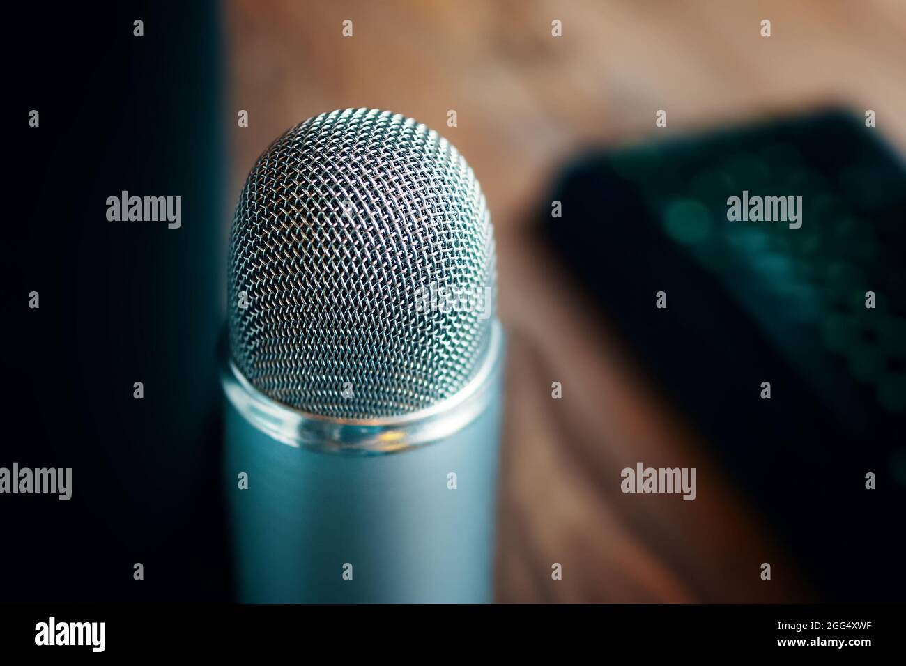 Radio show or audio podcast concept. Vintage retro old microphone for  broadcast. Computer keyboard on the background Stock Photo - Alamy