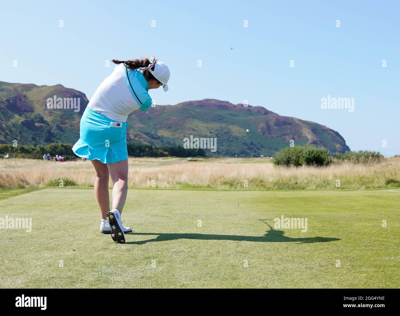 Team GB&I's Charlotte Heath plays from the second tee during the 2021 Curtis Cup Day 3 - Singles at Conwy Golf Club, Conwy, Wales on Saturday, Aug. 28 Stock Photo