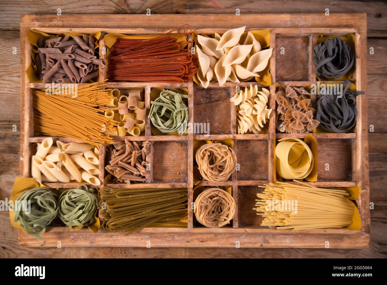 Presentation in wooden varieties of pasta made in Italy Stock Photo Alamy