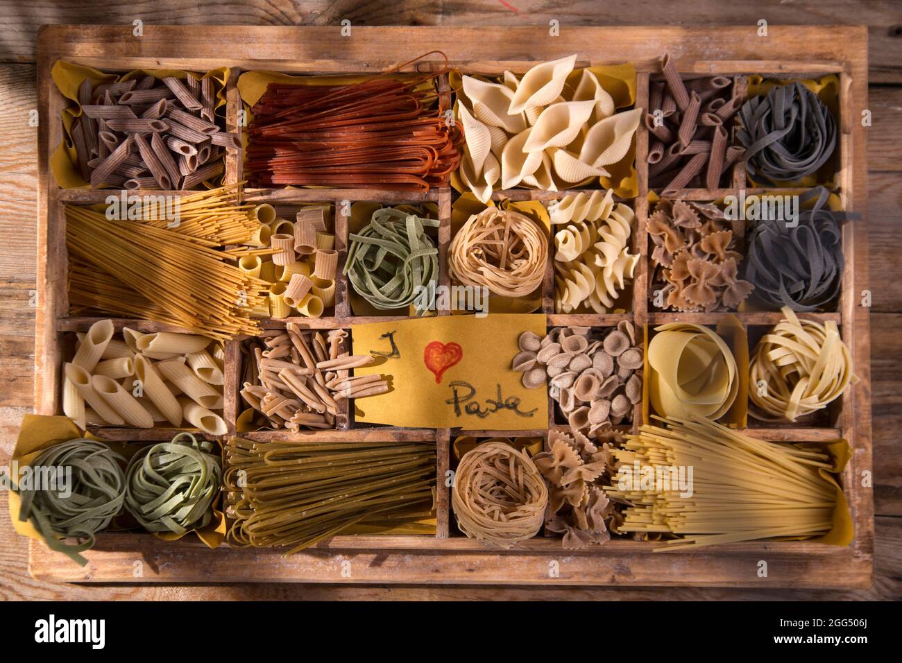Presentation in wooden varieties of pasta made in Italy Stock Photo Alamy