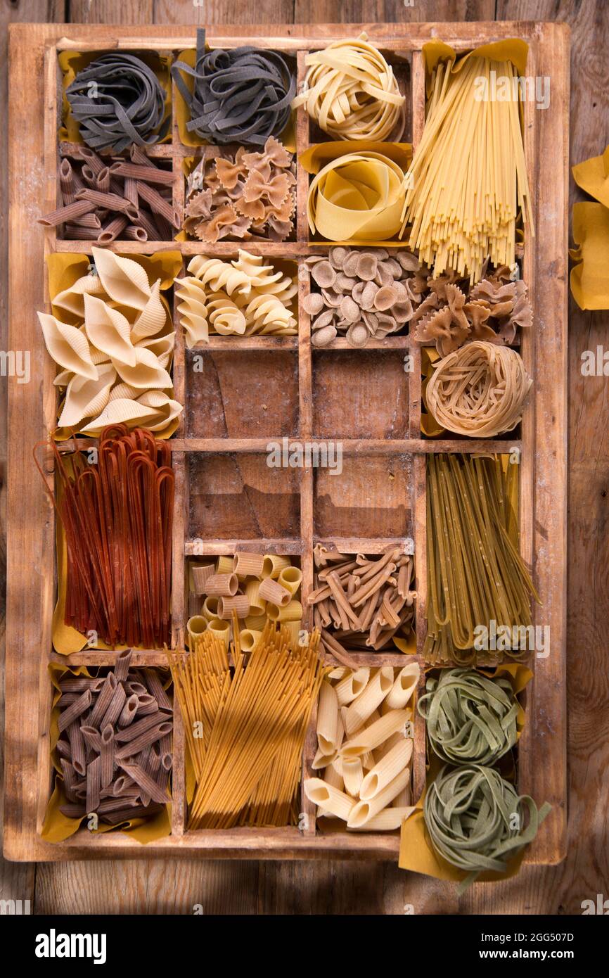 Presentation in wooden varieties of pasta made in Italy Stock Photo Alamy