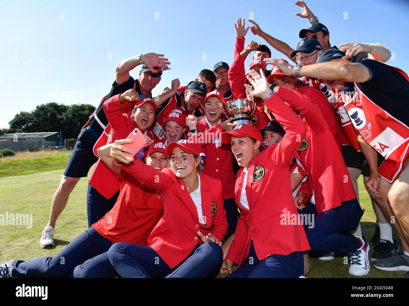 Team USA and their caddies pose for a team selfie after winning the Curtis Cup 12.5 points to 7.5 points over Team GB&I after the 2021 Curtis Cup Day Stock Photo