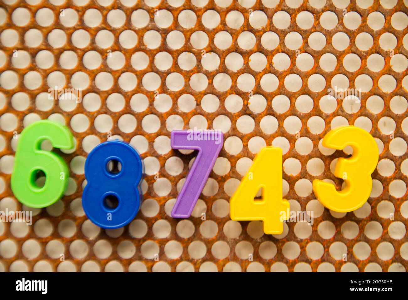 Series of letters and numbers on white base metal Stock Photo - Alamy