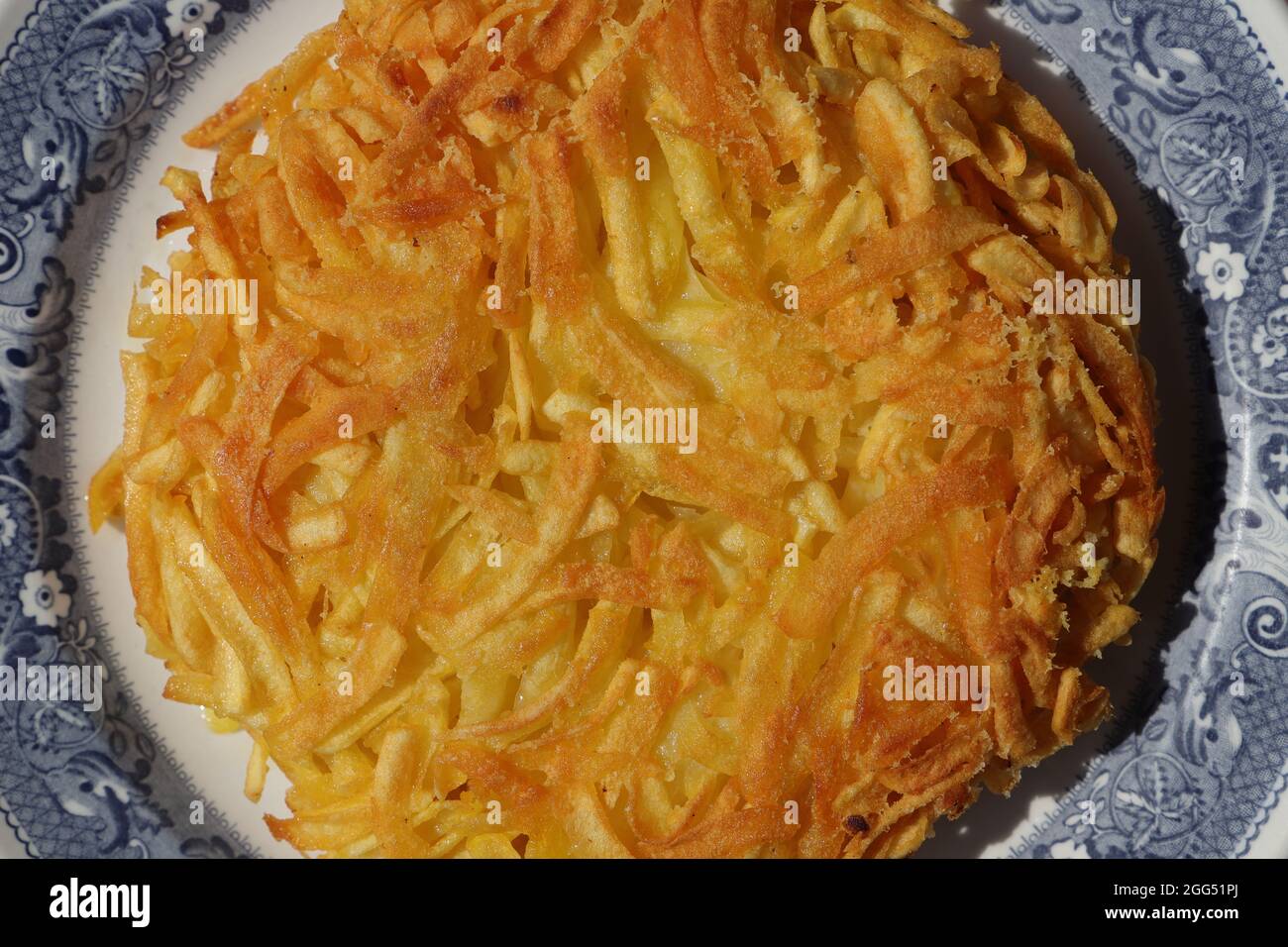 a delicious Appenzeller rösti filled with cheese Stock Photo