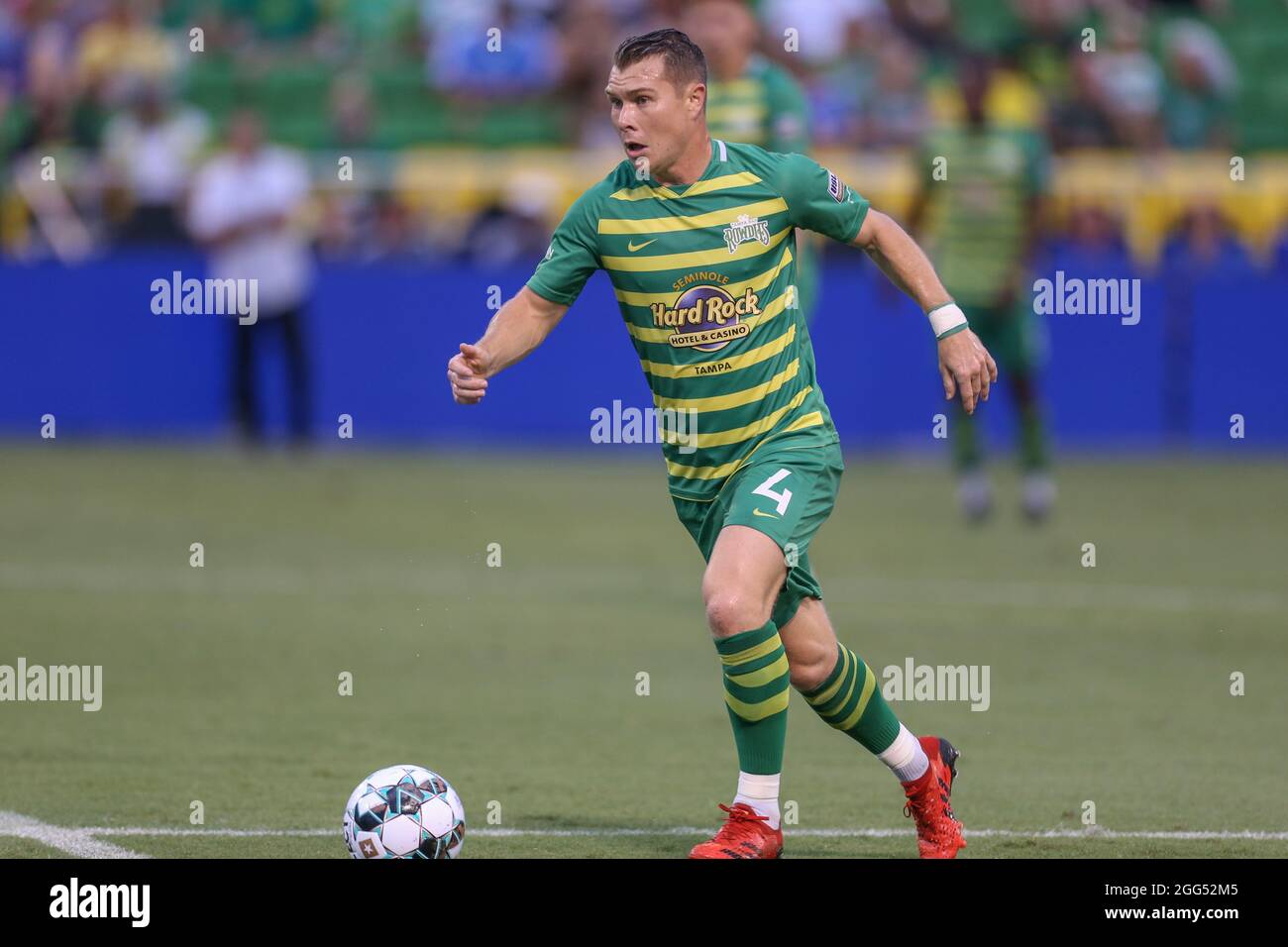 St. Petersburg, FL USA;  Tampa Bay Rowdies midfielder Lewis Hilton (4) carries the ball upfield during a USL soccer game against the Charlotte Indepen Stock Photo