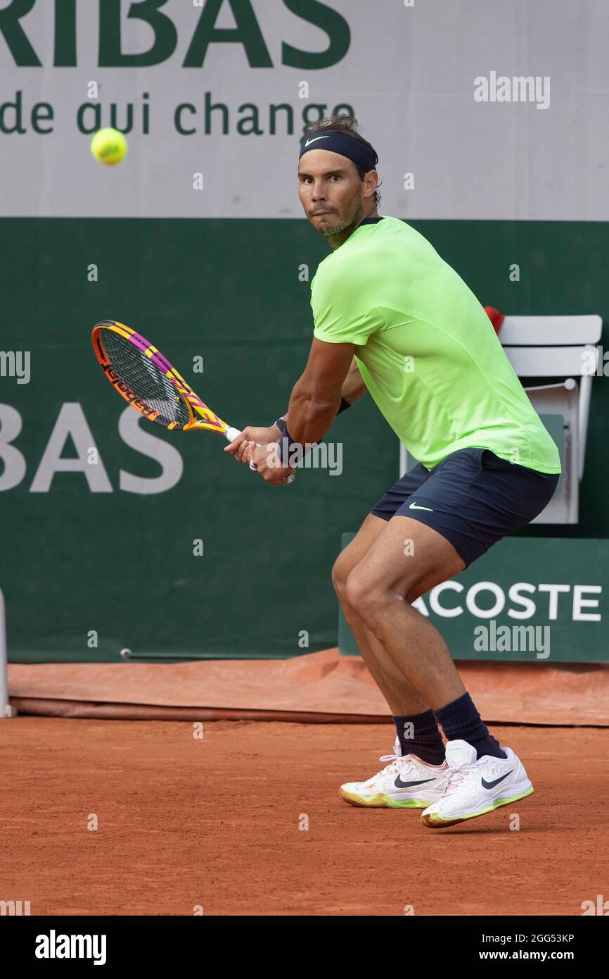 Spanish tennis player Rafael Nadal playing backhand shot,French Open 2021 tennis tournament, Paris, France. Stock Photo