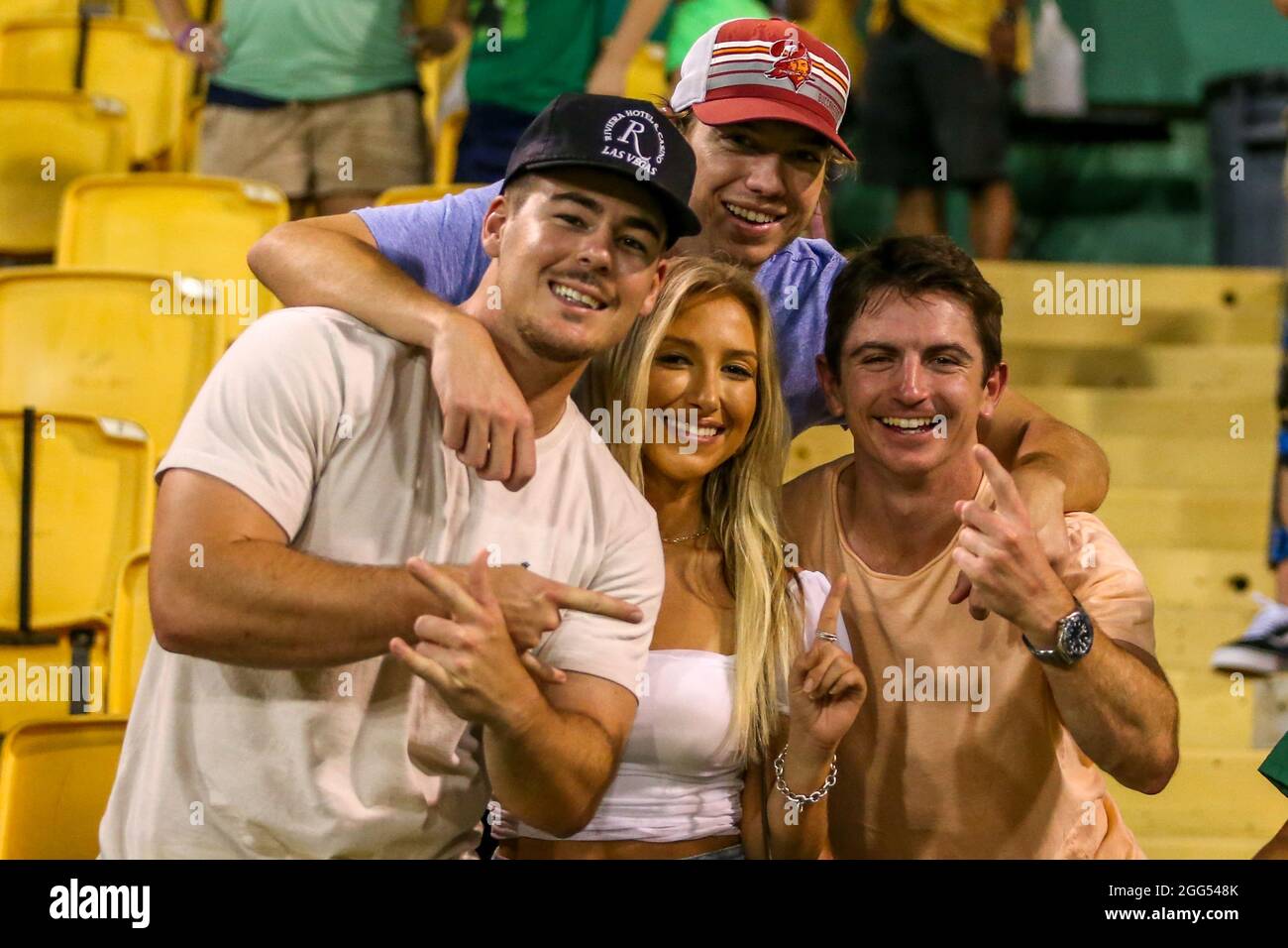 St. Petersburg, FL USA;  A group of friends enjoying a Saturday evening during a USL soccer game between the Tampa Bay Rowdies and the Charlotte Indep Stock Photo