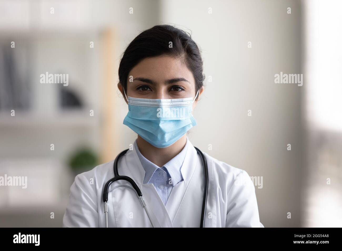 Portrait of confident indian infectious disease specialist. Stock Photo