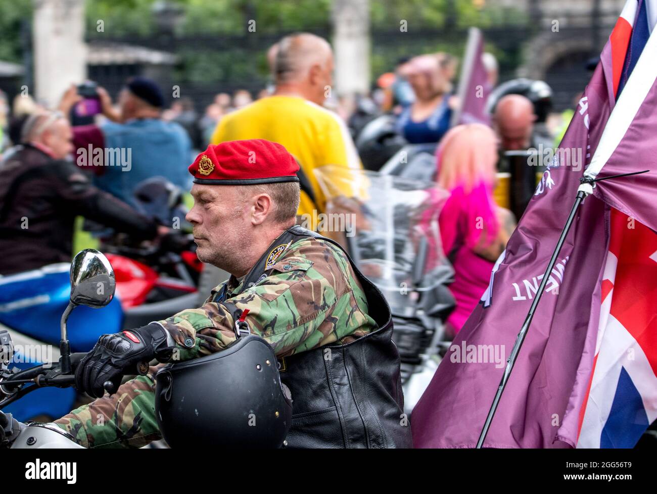 Royal Military police veteran joins others to protest in London at the treatment of veterans by successive UK Governments Stock Photo