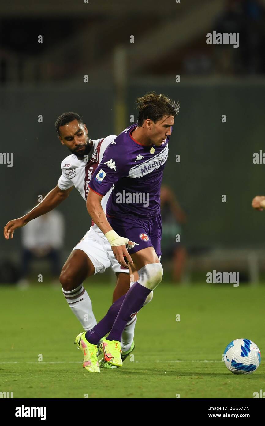 Dusan Vlahovic (Fiorentina)Koffi Djidji (Torino) during the Italian "Serie  A match between Fiorentina 2-1