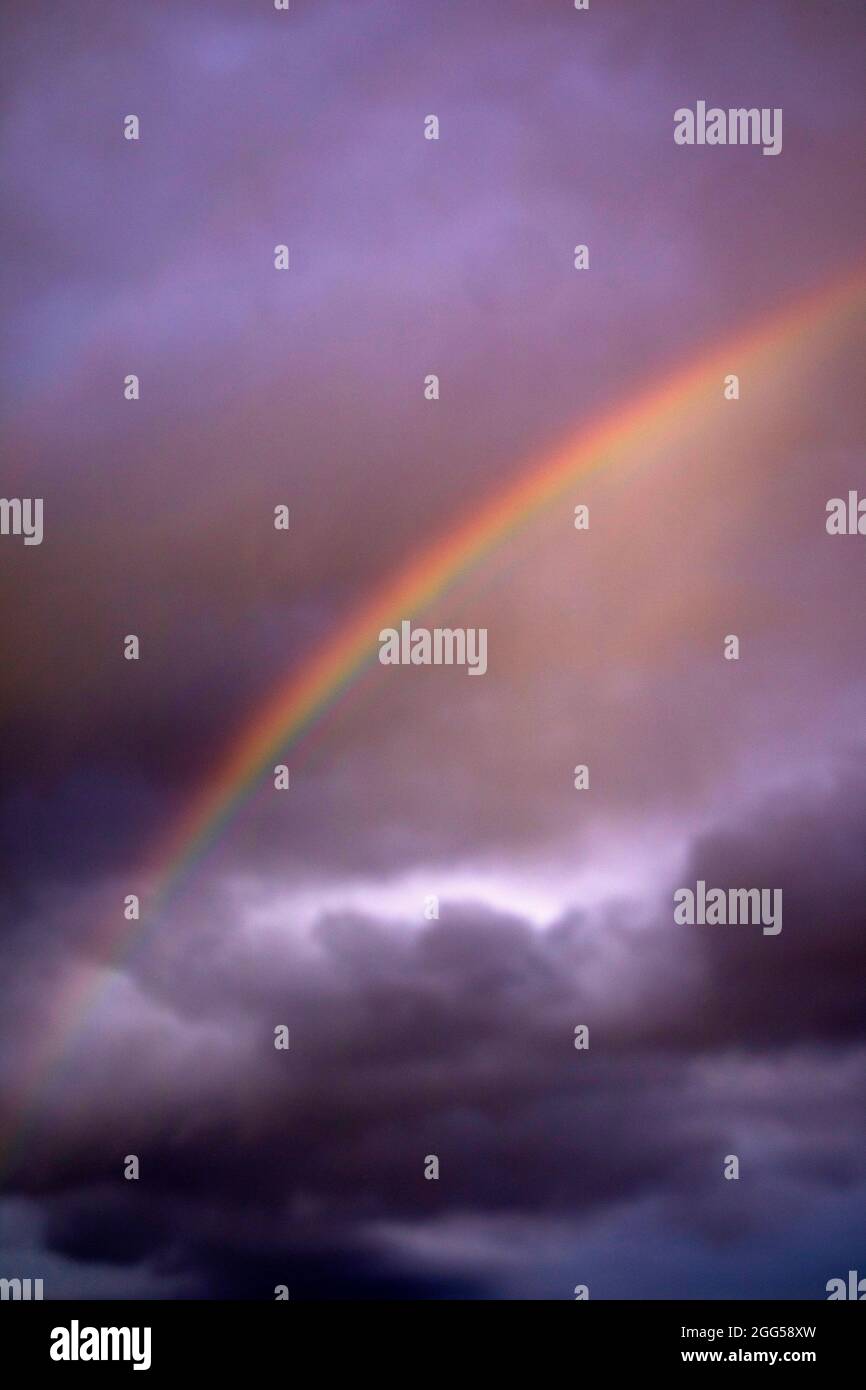 View of the sky after the storm with the presence of the rainbow Stock ...