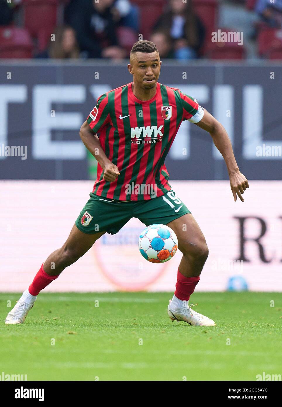 Felix UDUOKHAI, FCA 19   in the match FC AUGSBURG - BAYER 04 LEVERKUSEN 1-4 1.German Football League on August 28, 2021 in Augsburg, Germany  Season 2021/2022, matchday 3, 1.Bundesliga, 3.Spieltag. © Peter Schatz / Alamy Live News    - DFL REGULATIONS PROHIBIT ANY USE OF PHOTOGRAPHS as IMAGE SEQUENCES and/or QUASI-VIDEO - Stock Photo