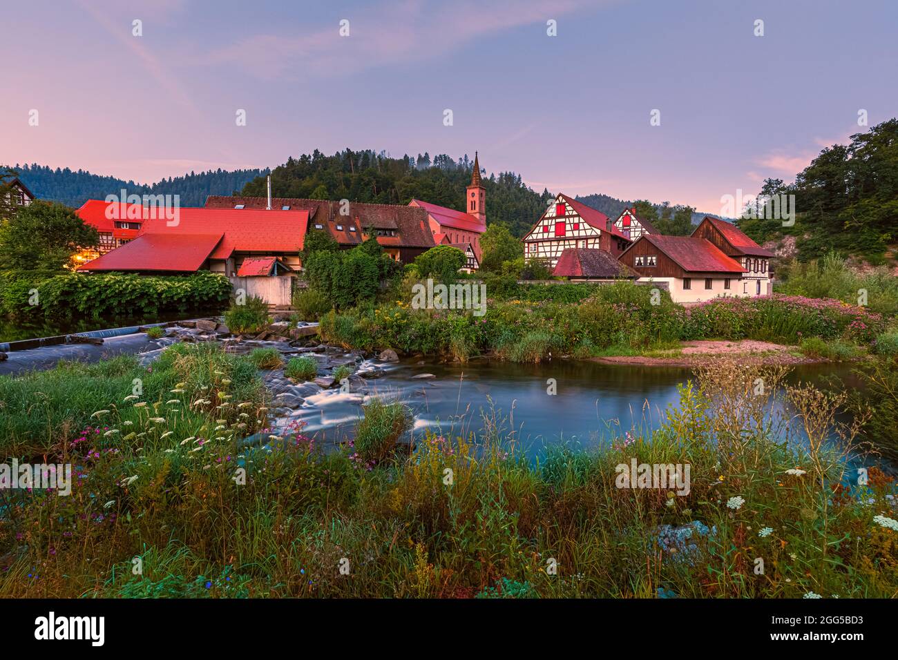 A summer sunrise with the Half-Timbered Houses in Schiltach, a town in the district of Rottweil, in Baden-Württemberg, Germany. It is situated in the Stock Photo