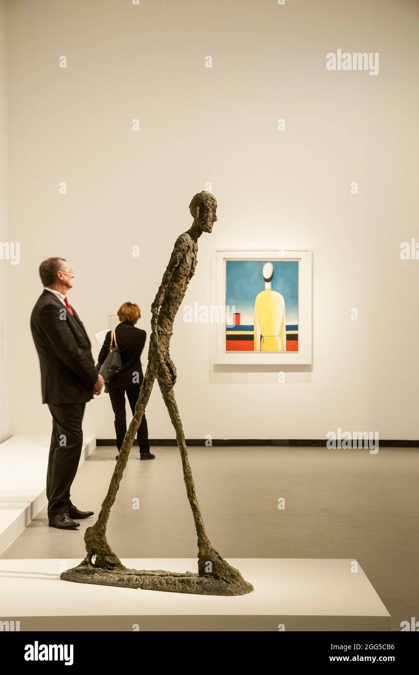 FRANCE. PARIS (16TH DISTRICT). FOREGROUND: SCULPTURE 'THE WALKING MAN I' BY ALBERTO GIACOMETTI, 1960. EXHIBITION 'THE KEYS OF PASSION'. LOUIS VUITTON Stock Photo